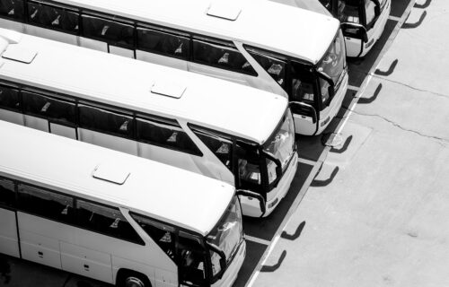 Coaches and buses with air conditioning unit shown on one