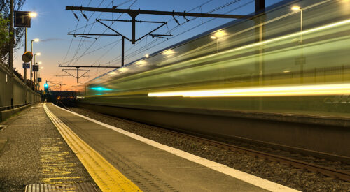 railway station and colorful sky at Blackrock in the evening, Dublin, Ireland. Long exposure shot of the coming train