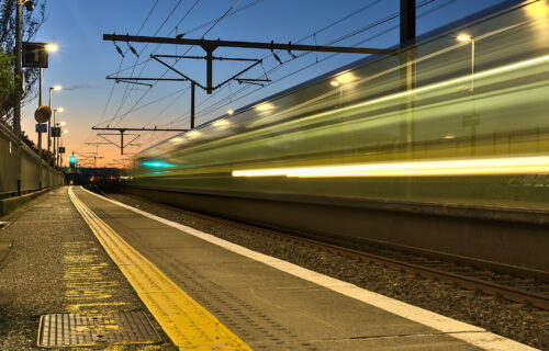 railway station and colorful sky at Blackrock in the evening, Dublin, Ireland. Long exposure shot of the coming train