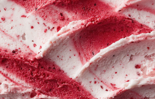 A close-up of raspberry ripple ice cream